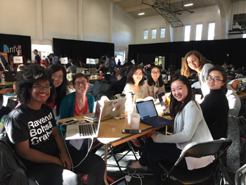 A group of women working together at Technica