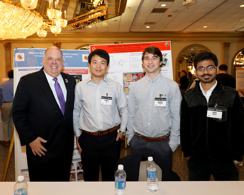 (L-R): Maryland Governor Larry Hogan and UMD Students Peiwen He, Michael D’Antonio, and Ayan Mallik. Photo Credit: Executive Office of the Governor.