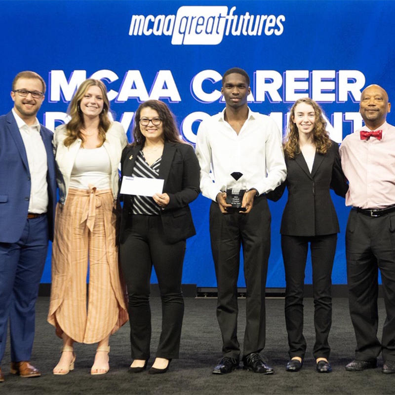 Hailey Brennan (second from right) and Amaya Caggino (third from left) are UMD's individaul MCAA student award winners.