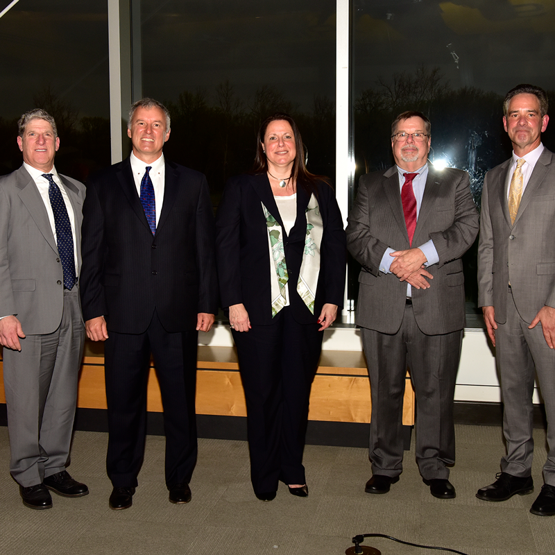 2023 Academy of Distinguished Alumni Inductees (from left to right) Daniel I. Newman (M.S. ’92), Dr. Andreas P. F. Bernhard (M.S. ’95, Ph.D. ’00), Flavia F. De Veny (B.S. ’92), Ronald Luzier (B.S. ’72), and Kerry Wisnosky (B.S. ’86)