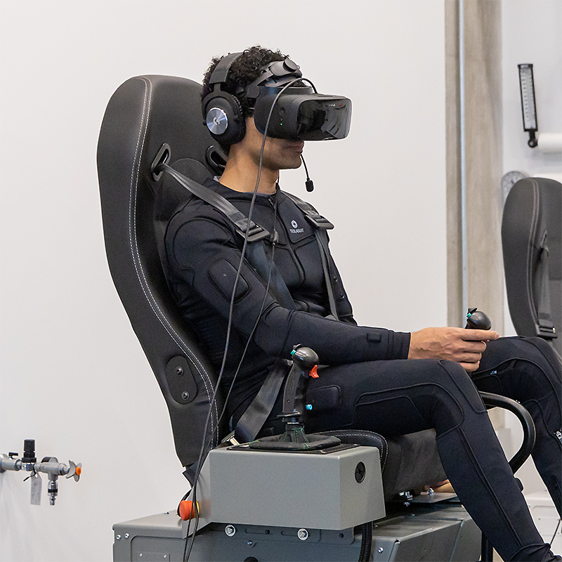 Aerospace engineering graduate student Michael Morcos tries out one of the BRUNNER motion-base VR simulators installed at University of Maryland (UMD) assistant professor Umberto Saetti's Extended Reality Flight Simulation and Control Lab. UMD is one of the only universities in the U.S. to house motion-base VR simulation equipment, which can reproduce flying conditions in a wide variety of aircraft. Photo credit: University of Maryland/Joanna Avery.