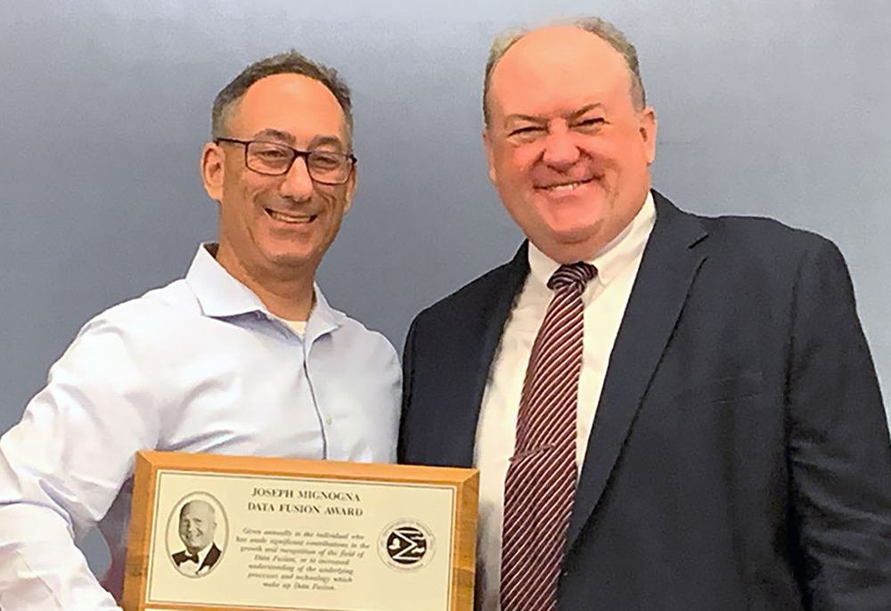Andrew Newman (left) with MSS NSSDF Chair Mark Owen following the Joe Mignogna Data Fusion Award ceremony. Photo credit: Military Sensing Symposia.