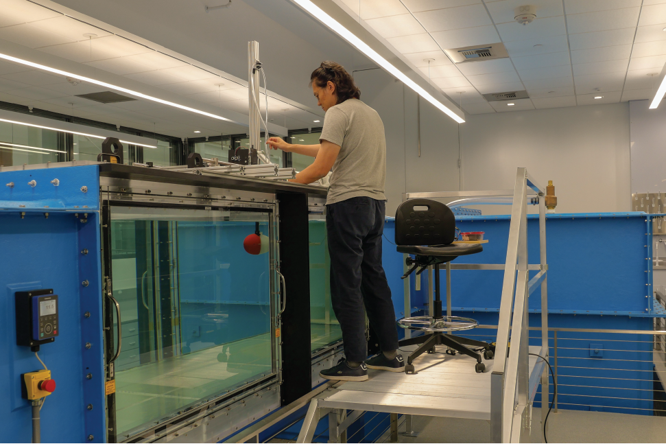 MATRIX Lab PhD Wei-Kuo Yen uses the MATRIX Lab's water tunnel to gather data