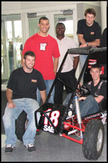 Clockwise from left, Terps Racing students with last year's all-terrain baja vehicle:  Dale Cornette, Bryson Stewart, Obafemi Ogunosunfisan, Michael Mennucci and Ryan Zumbrun (seated).