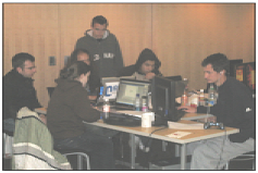 From Left: Winning team members Brian Doyle, Jenny Lees, Phillip Weisberg, Derek Willemstein, Alexander Tran, and Mike Couture hard at work during the Game Jam.