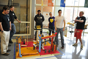 Members of the aerospace engineering team with their device.