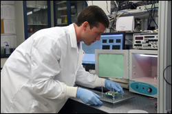 Matt Mosteller conducts a biomedical systems experiment in the MEMS Sensors and Actuators Laboratory.