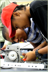 Students participate in the FIRST robotics workshop on campus, January 12, 2013.
