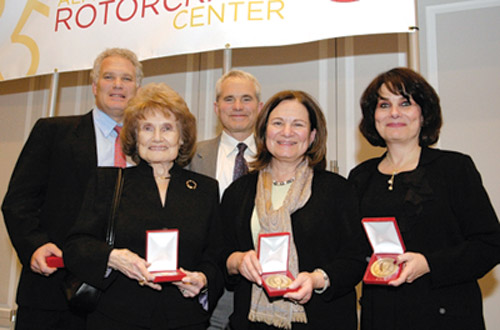 Members of the Gessow family celebrated the legacy of Alfred Gessow at the 25th anniversary of the Gessow Rotorcraft Center named in his honor in November 2007. Pictured with the Alfred Gessow Medal, which recognizes significant contributions in rotorcraft, are, from back left, sons Jory and Jody Gessow, Elaine Gessow (front left) and daughters Laura Goldman and Lisa Michelson.