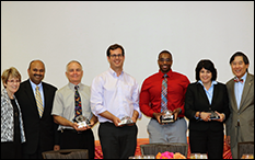 (L-R) Mary Sue Coleman, Amitabh Varshney, Michael Raupp, Nicholas Diakopolous, Rashawn Ray, Michele Gelfand, and Wallace Loh.