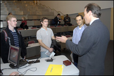 Evan Jones, president and CEO of Digene, speaks with students after the lecture.