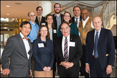 The 2017 UMB-UMCP Seed Grant recipients celebrate a year of research at the UMB-UMCP Seed Grant Symposium with (bottom row, from left) UMCP President Wallace Loh, Ph.D., JD; Vice President for Research for UMB/UMCP Laurie Locascio, Ph.D.; UMB President Jay A. Perman, MD; and UMB Executive Vice President, Provost, and Graduate School Dean Bruce Jarrell, MD, FACS.