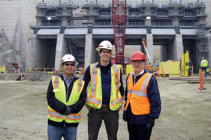 Galloway (right), in one of his many roles, joins fellow engineers at Folsom Dam in California in 2015 to study dam stability in mountainous areas. Photo courtesy: Gerry Galloway