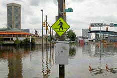 Water covers the streets around the Inner Harbor after downtown Baltimore was flooded by Hurricane Isabel in September 2003.(AP Photo/Gail Burton)