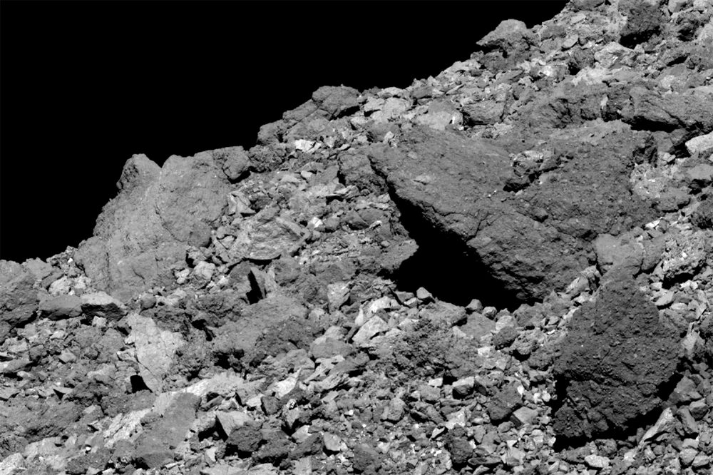 This image shows a boulder jutting out from asteroid Bennu’s northern hemisphere. It was taken by the PolyCam camera on NASA’s OSIRIS-REx spacecraft on April 5, 2019, from a distance of 1.7 miles (2.8 km). Credit: NASA/Goddard/University of Arizona