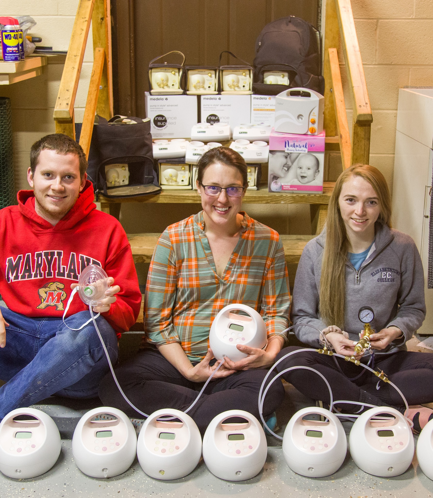 A group of engineers in Maryland (L-R: Alex Scott, Brandi Gerstner, and Rachel LaBatt; not pictured: Grant Gerstner) are repurposing breast pumps as ventilators for COVID-19 patients. (Photo: Courtesy of Rachel LaBatt)