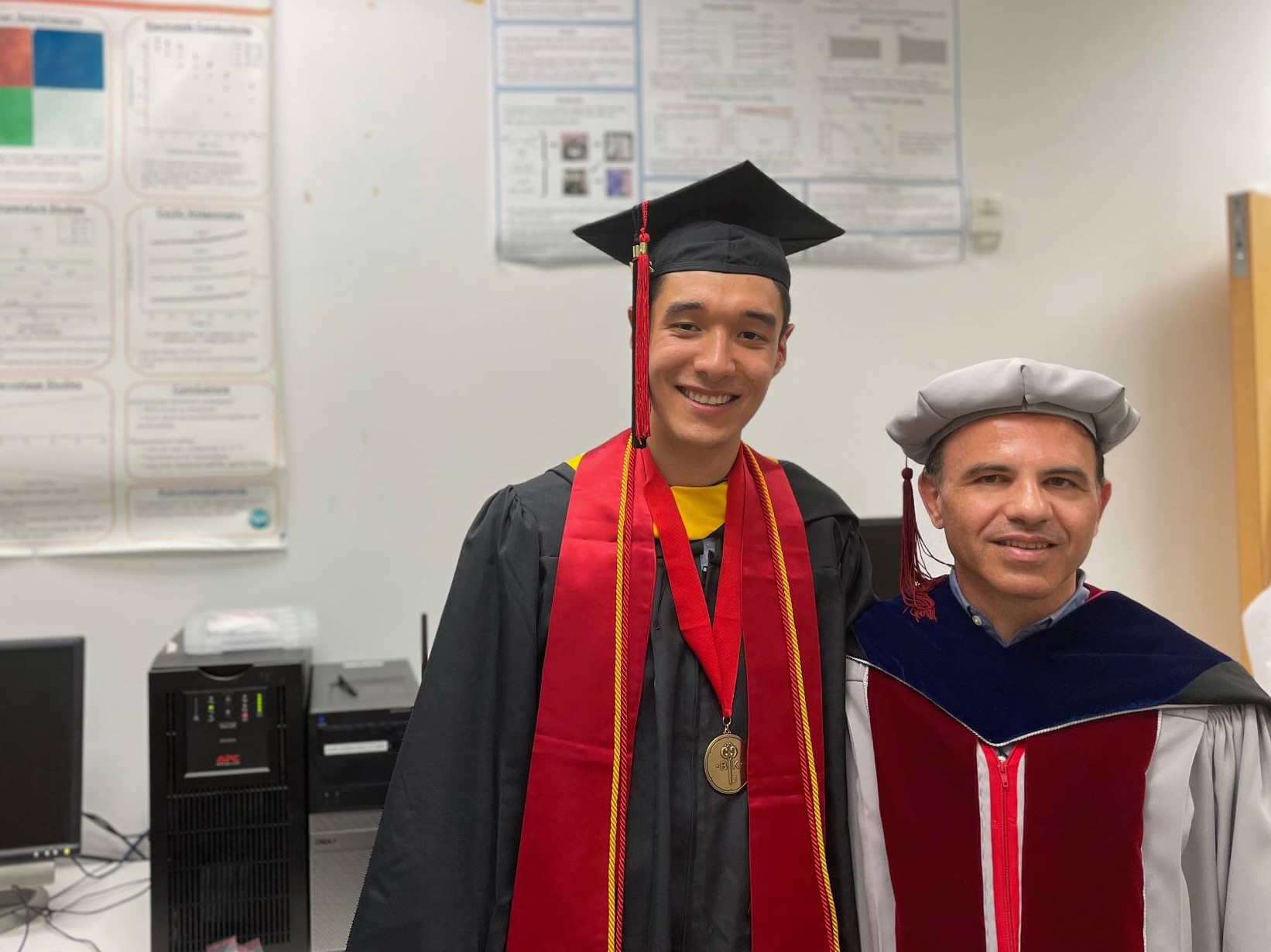 Jesse Matthews and Peter Kofinas at the Spring 2021 commencement. 