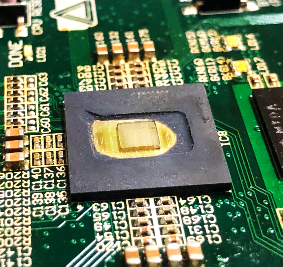 Diamond on top of a decapped integrated circuit.