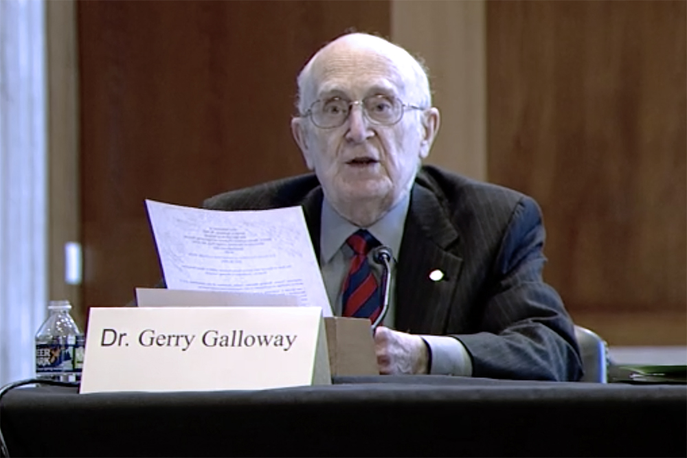 A photo of retired UMD professor Gerald Galloway addressing the U.S. Senate