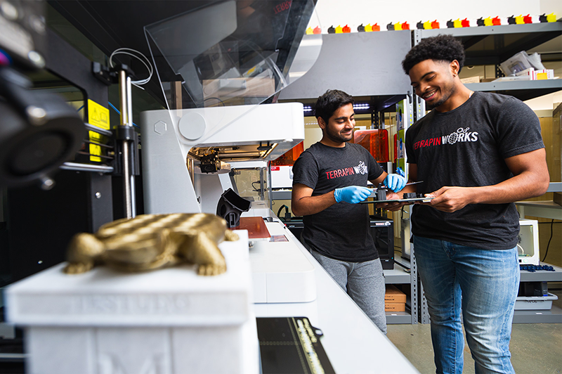 Engineering students work to create a 3D-printed Testudo in the Advanced Fabrication Lab in A. James Clark Hall. Photo: Photo: John T. Consoli