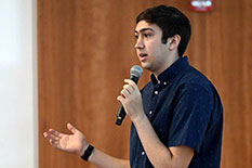 Amazon-UMD Design Challenge winner Elyas Masrour, a computer and electrical engineering major, talks Friday at UMD's Amazon Day symposium about his work to simplify the Spotify interface for people with autism.