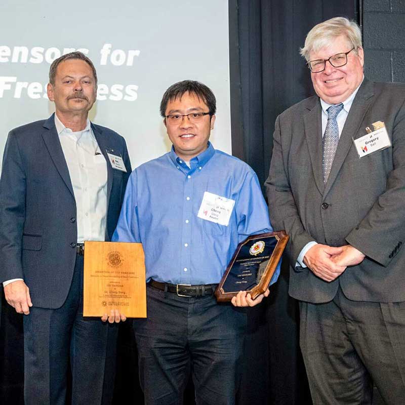 
From left, UM Ventures, College Park Director Ken Porter; Invention of the Year winner Assistant Professor Cheng Gong; and Vice President for Research Gregory F. Ball at Innovate Maryland. (Photo by Mike Morgan)
