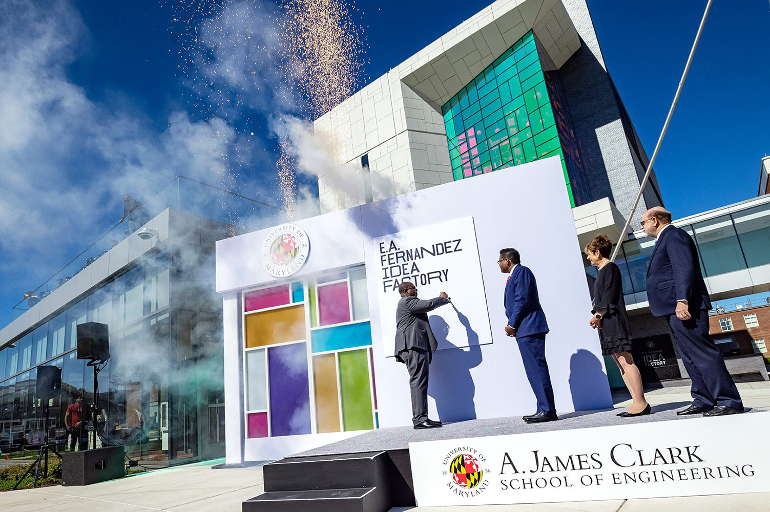 From left, Maryland Engineering Dean Samuel Graham, Jr.; University President Darryll J. Pines; Courtney Clark Pastrick; and Emilio Fernandez ’69 ceremonially “unlock” the new IDEA Factory at this morning’s dedication ceremony. Photo: Stephanie S. Cordle