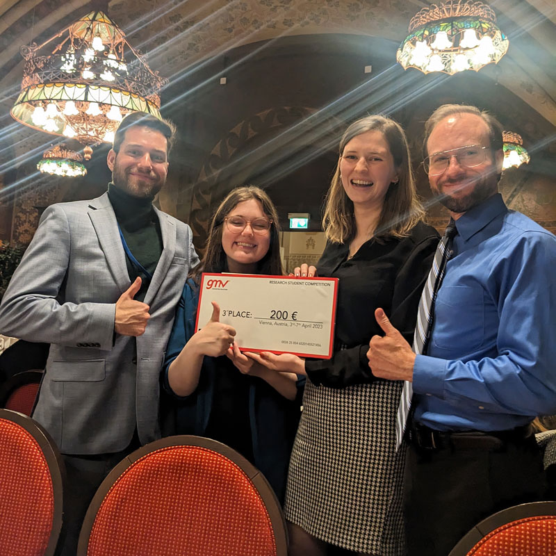 THEO & MUFFIN team members Raymond Squirini, Grace Zimmerman and Melissa Buys with Professor Brent Barbee at the 2023 Planetary Defense Conference.