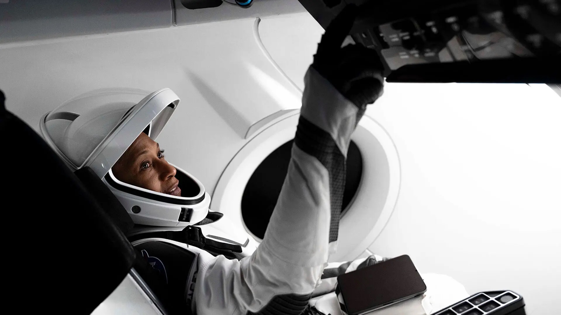 Jeanette Epps. M.S. '94, Ph.D '00 (below, pictured in crew capsule) is part of a NASA-Space X crew of three American astronauts and one Russian cosmonaut that lifted off late Sunday night from Kennedy Space Center for a six-month mission on the International Space Station.Photo by CHANDAN KHANNA/AFP via Getty Images
