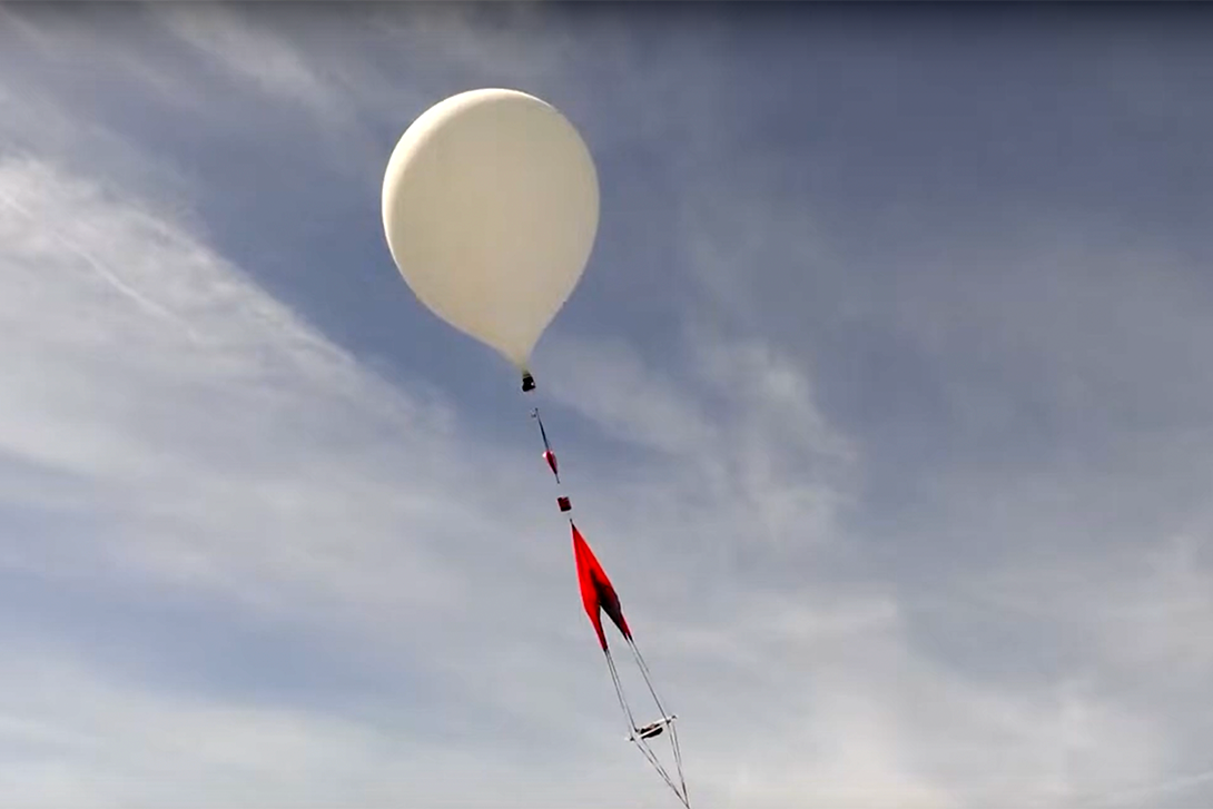 A balloon launched by UMD Nearspace rises into the sky on Monday, April 8.