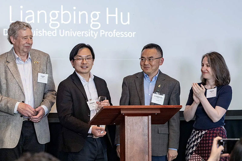 Distinguished University Professor Liangbing Hu (second from left) is honored at the Innovate Maryland Invention of the Year award event. Also pictured (from left), Professor Robert Briber, Department of Materials Science and Engineering Chair Ji-Cheng (JC) Zhao, and UM Ventures Associate Director Felicia Metz. Photo by Stephanie S. Cordle.
