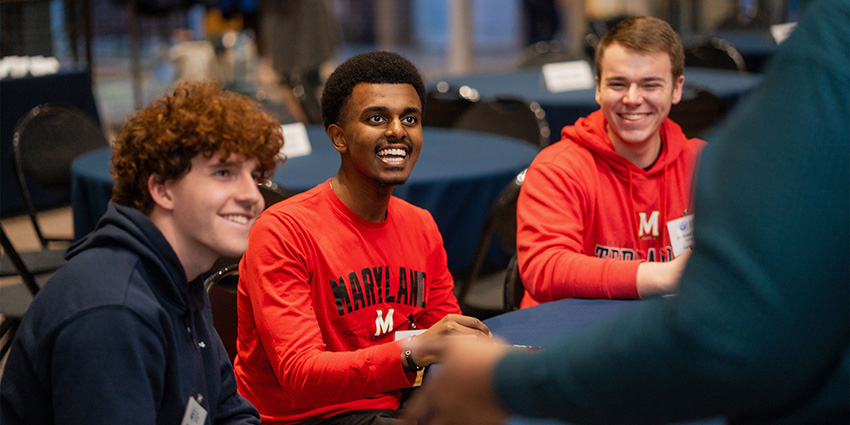 UMD students Abel Eshetu (center) and Michael O'Neill (right) participate in the Clark Scholars Program Network Summit at Johns Hopkins University earlier this year. The network, which supports talented students with financial need at 11 top engineering schools, is receiving funding from $51.7 million in new philanthropic investments from the A. James & Alice B. Clark Foundation. The series of commitments also includes funds for scholarships, professional development opportunities and a new philanthropy challenge. (Photo by Shawne Turrentine, Art Trends Photography)