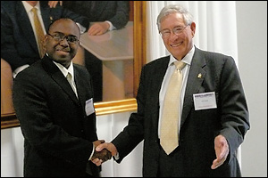 BioE graduate student and 2008 Fischell Fellow Marc Dandin (left) is congratulated  by department benefactor and namesake Dr. Robert E. Fischell (M.S. '53, right).