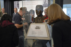 Students view the bust of Glenn L. Martin in its new display.