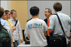 Al Joseph speaks with students following his lecture.
