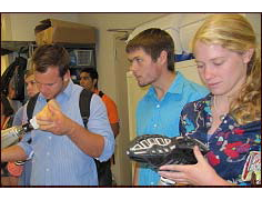 STS, engineering and kinesiology undergraduates examine prosthetic legs in the fabrication laboratory at Walter Reed Army Medical Center on Oct. 1.