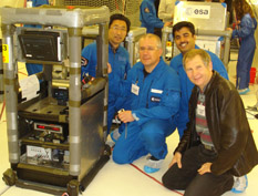 PHOTO 1 (ABOVE): Team members on the European Space Agency A300 aircraft in April 2010. From left to right:  Jungho Kim, Paolo DiMarco (professor, University of Pisa), Rishi Raj (graduate student), and Serguei Dessiatoun (research professor, U-Md.). (For the hi-res version, click here.) PHOTO 2: Rishi Raj (graduate student, center), Martin Karch (exchange student, left) and Jungho Kim (right) in the low-g environment on the European Space Agency A300 aircraft in March 2008. (For the hi-res version, click here.) 
