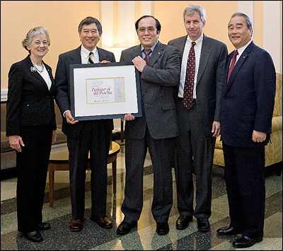 At a ceremony celebrating the Fischell Department of Bioengineering's new partnership with Canon U.S. Life Sciences (CUSLS), CUSLS founder and senior fellow Hiroshi Inoue was inducted into the faculty as a Professor of the Practice. Left to right: past National Science Foundation director, National Academy of Sciences member, and Distinguished University Professor Rita Colwell; University of Maryland president Wallace Loh; Hiroshi Inoue; BioE Professor and Chair William E. Bentley; and Canon U.S.A. president and CEO Yoroku Adachi. Photo by John T. Consoli.