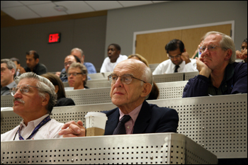 Participants listen to keynote speaker Bill Borgia from Lockheed Martin speak on robotics and economic development.