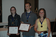 Koscielniak, Sickenberger, and Benson receive their award