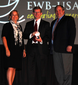 EWB advisor David Lovell accepts his award.