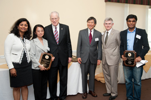 The winning team in the Information Sciences category poses with USM Chanellor Brit Kirwan, UMD President Wallace Loh and UMD Vice President for Research Pat O'Shea.