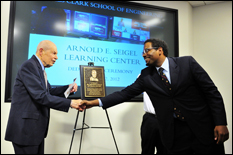 Dean Darryl Pines and Dr. Arnold Seigel shake hands at the Arnold E. Seigel Learning Center Dedication Ceremony.