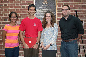 Mian Khalid (second from left) receiving the Tri-Star Award.