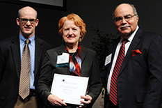 Martha Connolly, pictured in the middle, as she is inducted into the AIMBE College of Fellows.