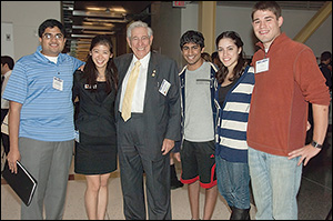 Dr. Fischell (center) with students at the 2012 Fischell Festival.