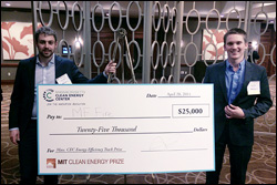 Taylor Myers (left) and Ryan Fisher (right) of MF Fire celebrate winning the $25,000 Energy Efficiency Track Prize at the MIT Clean Energy Prize competition.