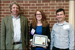 Dr.Jane Cornett (Ph.D. ’13, materials science and engineering) at the awards ceremony. Left: MSE Professor and Chair Robert M. Briber. Right: MSE Associate Professor Oded Rabin.