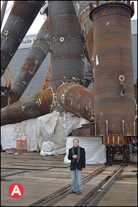 Professor Christou (MSE) at the base of an offshore wind turbine in Germany.