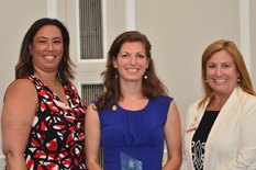 Goldwasser (center) with Nicole Pollard (left), president of the UMD Alumni Association, and executive director Amy Eichhorst (right).